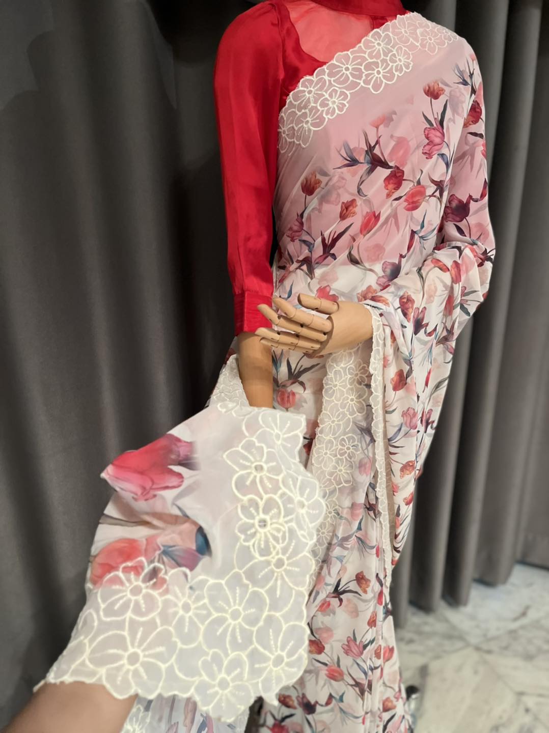 Georgette saree, featuring intricate 3D cutwork along the sides