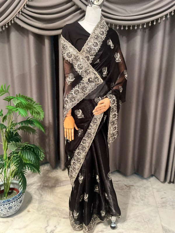 Classic elegance Black Jimmy Choo saree with stunning stonework and a matching blouse piece.