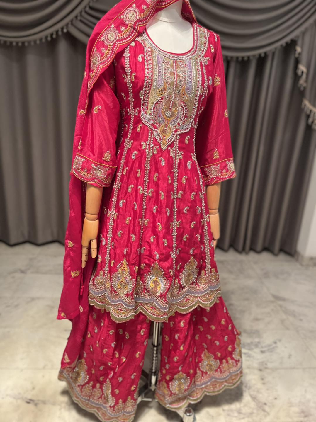 Stunning Red Anarkoli with intricate stone & embroidery work all overIncludes beautifully worked divider pants & dupatta