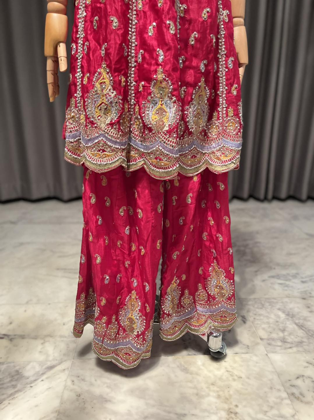 Stunning Red Anarkoli with intricate stone & embroidery work all overIncludes beautifully worked divider pants & dupatta